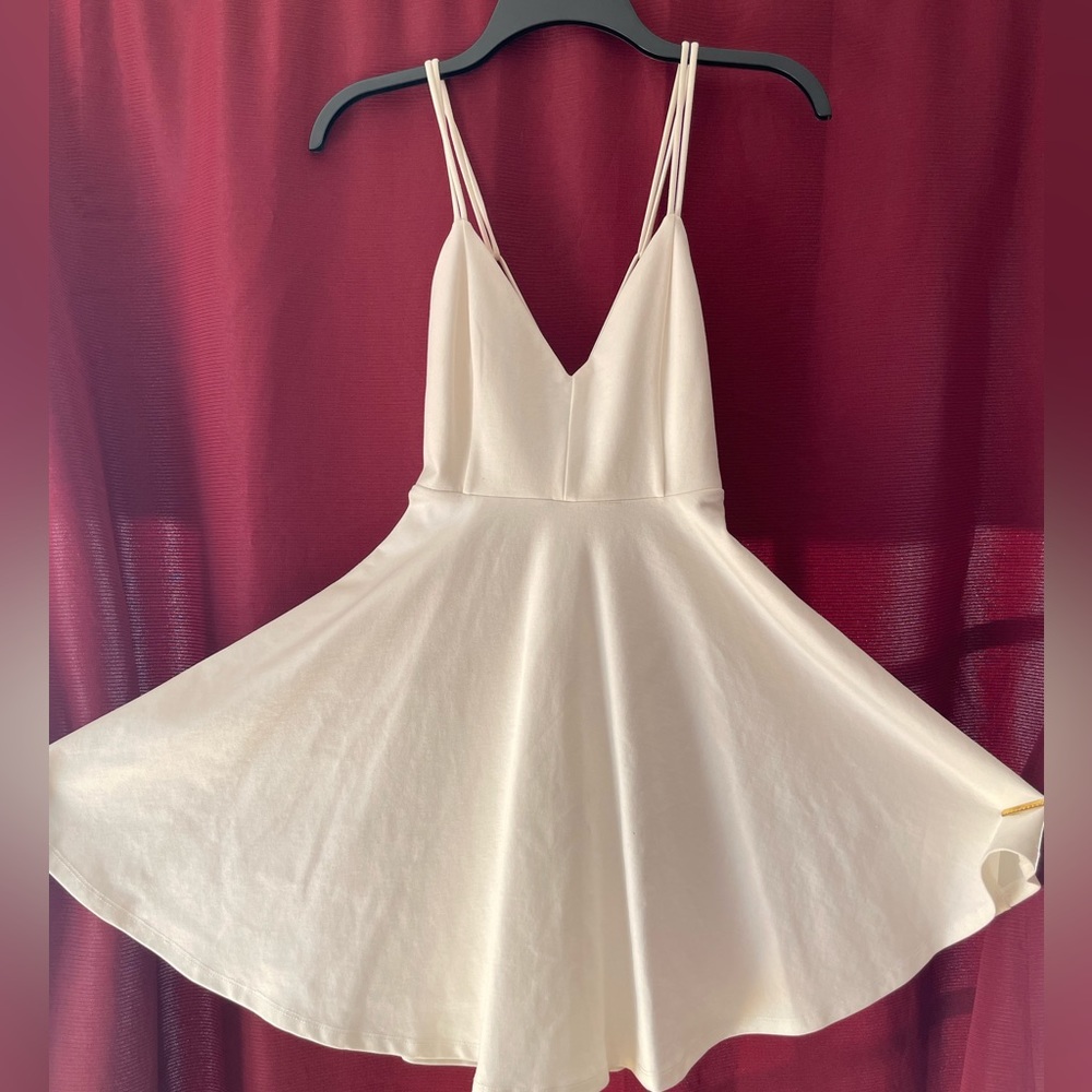 Flattering white dress I wore to graduation and never again.
